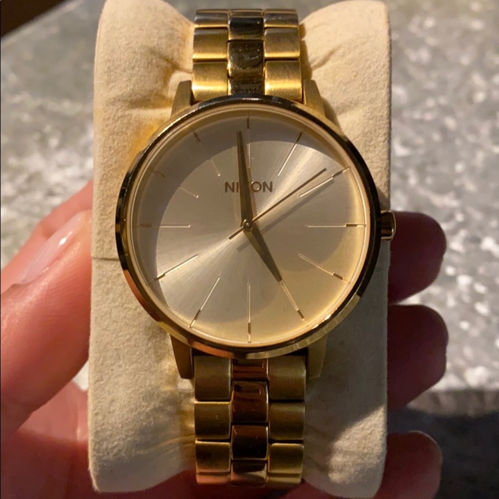 Women’s gold NIXON watch